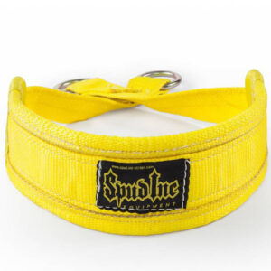 A yellow Spud Belt Squat Belt Small resembles a hip belt, featuring metal rings at one end and a black and yellow Spud Inc Equipment patch sewn onto it.