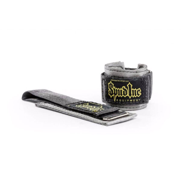 The Spud Choker Wrist Wraps feature a gray design with black and yellow Spud Inc. Equipment branding. The wrist wrap is rolled into a cylinder, while the matching strap is laid flat to highlight its texture and design.