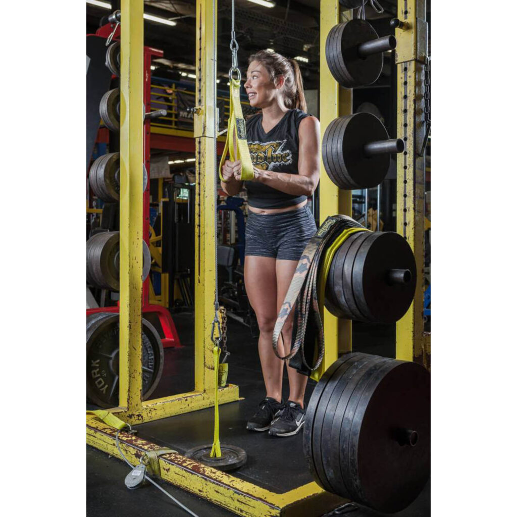 Spud Pulley System. Woman doing Tricep Pressdowns