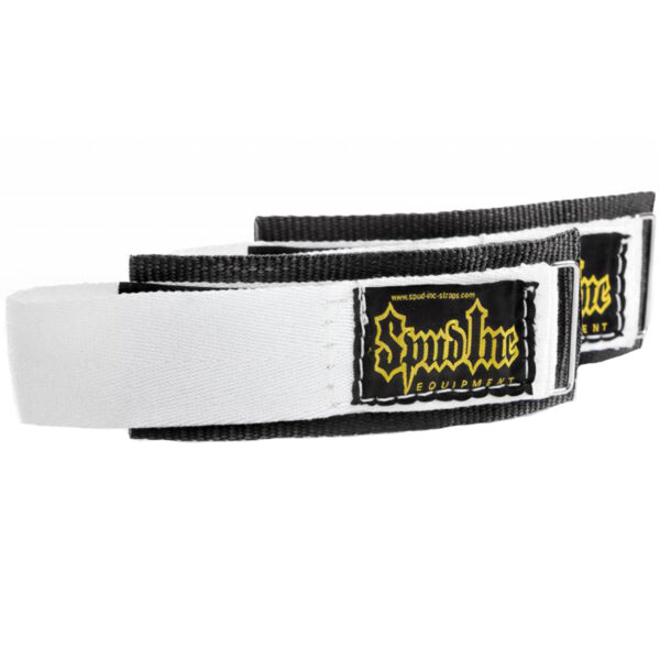 Two Spud Velcro Wrist Wraps in black and white feature a rugged design with Spud Inc. Equipment branding, ideal for weightlifting or strength training.