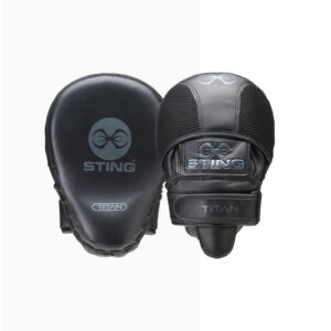 A pair of black Sting Titan Neo Gel Focus Mitts are displayed against a white background. The left mitt features the Sting logo and name, while the right mitt is upright, highlighting its strap and design details.