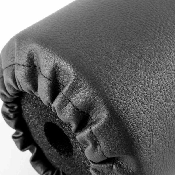 Close-up of the Upholstery Foam Roller, 110mm x 190mm, in black leather with a soft, textured surface highlighting the fabrics detail and cushions shape.