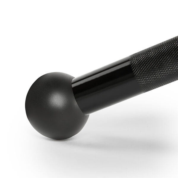 The ATX® Lat Bar Blackline is shown in close-up, displaying its black, textured hand grip with a rounded end, resting on a white surface.