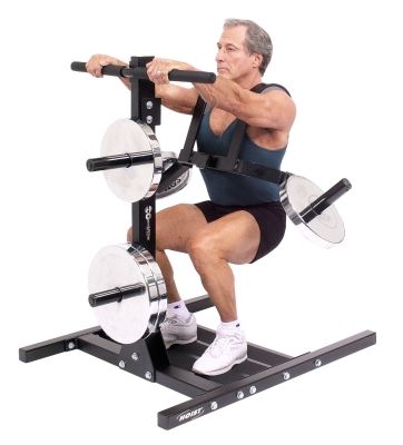 Frank Zane Squatting with a leg blaster