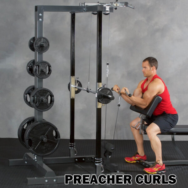 A person in a red sleeveless shirt performs preacher curls with the Ironmaster IM2000 Self-Spotting Smith Machine at the gym. Weight plates are visible, and PREACHER CURLS is written at the bottom of the image.