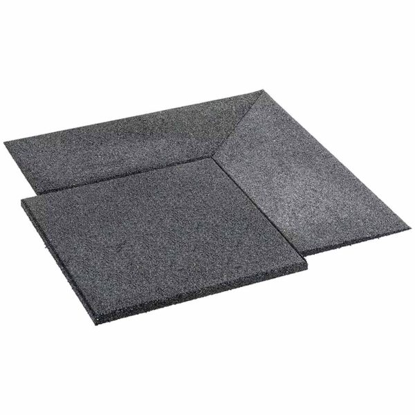 Close-up of the GymFloor RTS 50x50@20mm System, featuring dark gray interlocking rubber mats with a textured surface. Parts of two tiles are shown at an angle, highlighting the modular design.