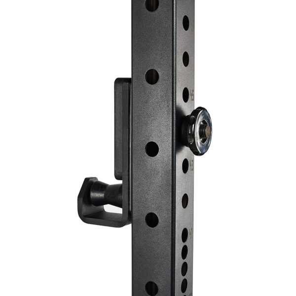 Close-up of the ATX® Roller J-Hooks Universal, featuring a black metal part with holes and a silver knob. The apparatus includes a side handle, likely part of weightlifting or adjustable rack equipment.