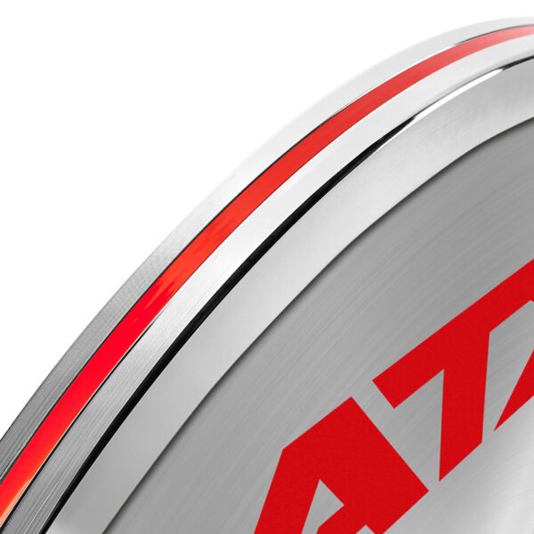 Close-up of a bicycle wheel rim with a sleek silver finish, bold red stripe, and partial red lettering, echoing the modern and sporty appearance of the ATX® 25kg Chrome Powerlifting Single Plate.