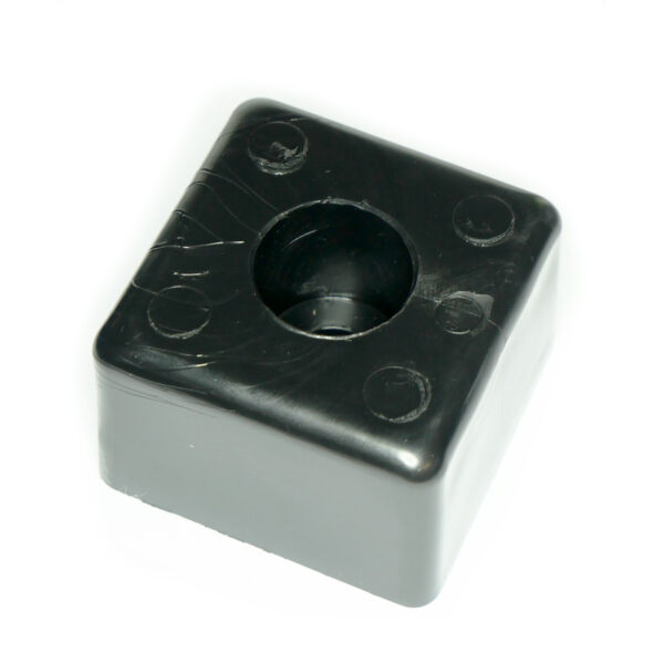 A Bump Stop 50mm x 50mm, black with a textured surface, features a central hole, rounded edges, and four raised circles at each corner.