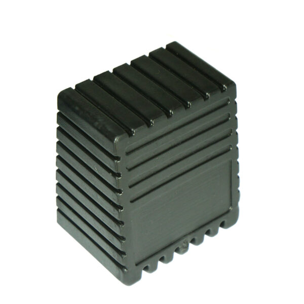 The Rubber Foot 50mmx50mm is a black, rectangular plastic object with ribbed edges, featuring a grooved design that resembles a heat sink or protective casing.