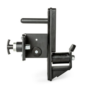 A black mechanical device with a cylindrical handle, a knob, and a roller. It features a metal plate with bolts and various geometric components. The device is positioned against a white background.
