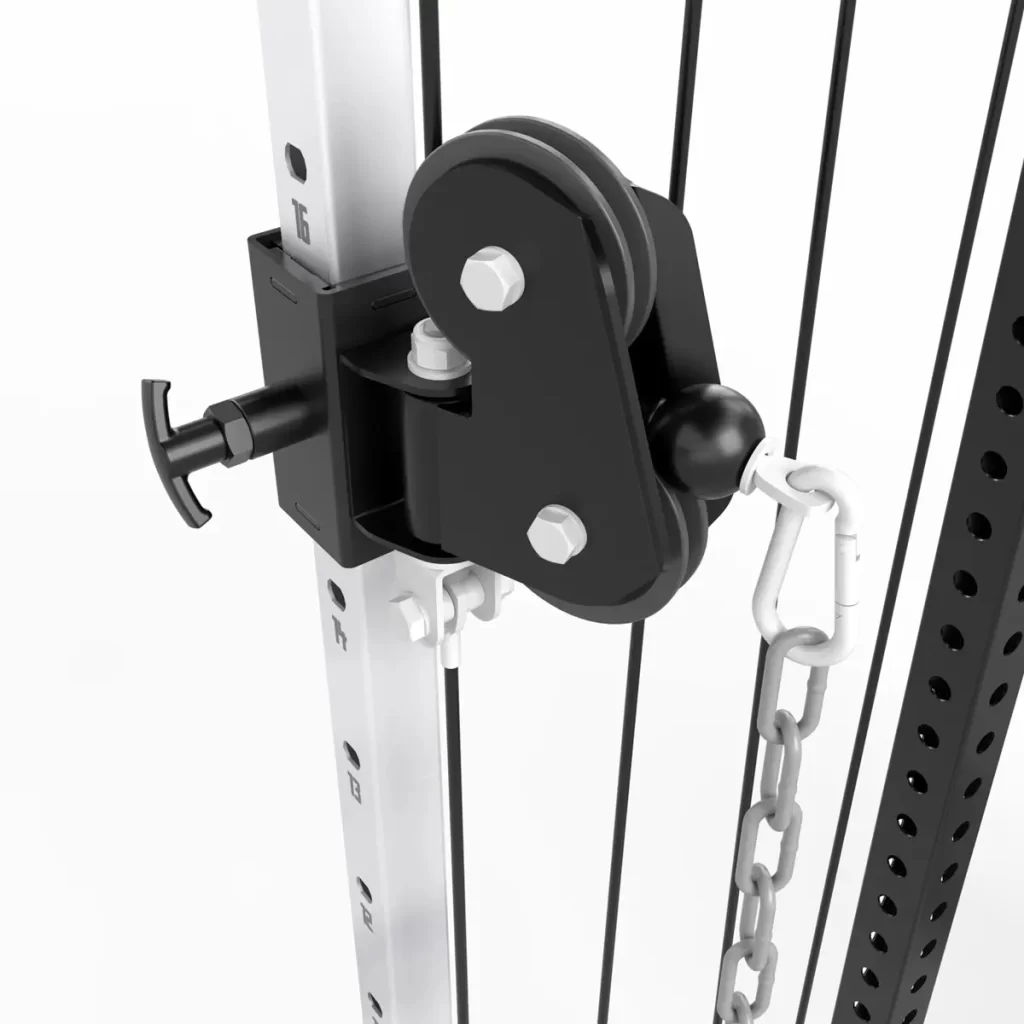 Close-up of the ATX® Cable Corner Station, showing a black pulley system attached to a metal frame with numbered height adjustments. It has several cables connected with a clip and chain link, appearing functional and suitable for gym use.