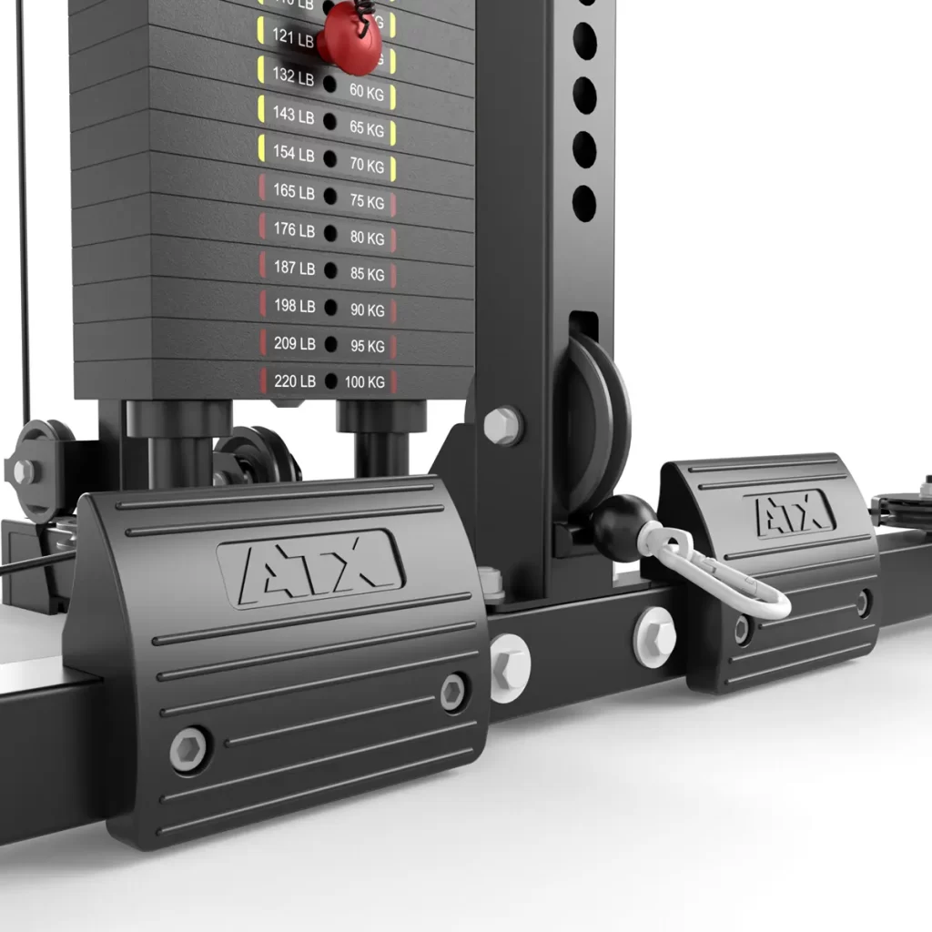 Close-up of the ATX® Cable Corner Station weight stack set at 88 lbs (40 kg), featuring footrest branding and a sleek black and silver design.