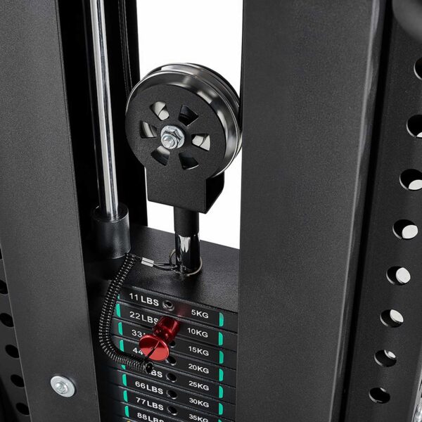 Close-up of a weight stack on a cable weight machine with labeled weights in pounds and kilograms. A pin is inserted at 33 pounds (15 kg) to select the desired weight for lifting, showcasing the precise functionality of this versatile fitness equipment.