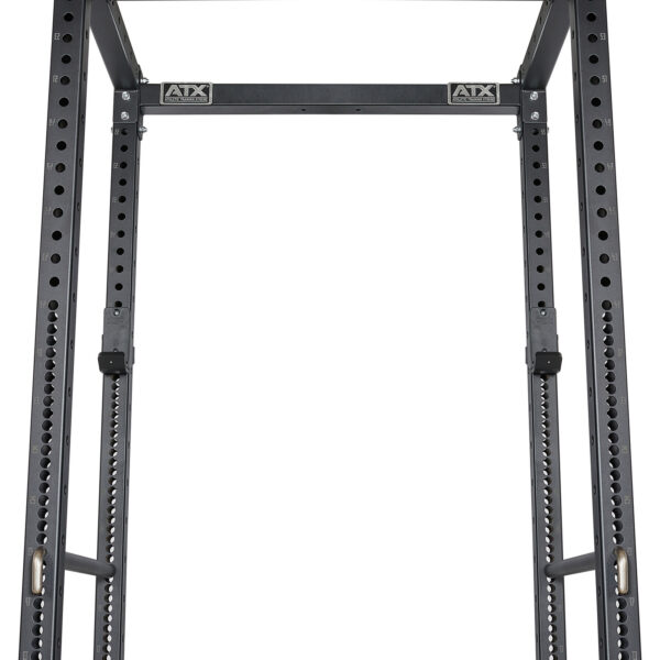 A close-up of the ATX® Power Rack 755 Short Distance for weightlifting shows its metal frame with multiple barbell adjustment holes and logos on the top crossbar, set against a plain white background.