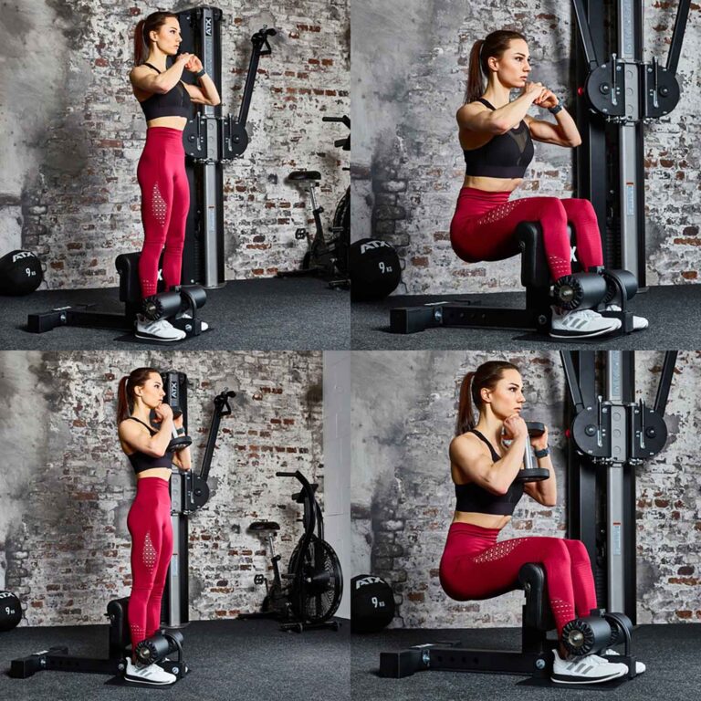 A woman in a gym demonstrates a squat exercise using a sissy squat machine. She wears a black top and red leggings. The brick wall in the background holds gym equipment like a stationary bike. The image captures different stages of the exercise.