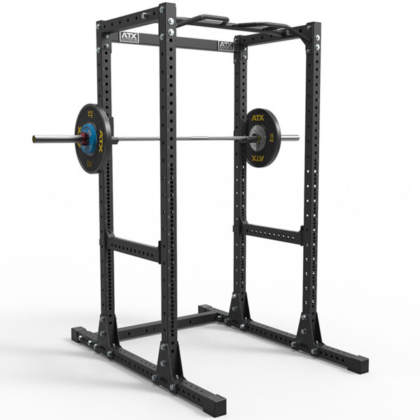 The ATX® Power Rack 755 Short Distance, a sturdy black rack, includes a barbell and weight plates. It features safety bars and multiple adjustment holes for versatile training. The robust design stands out against the white background.