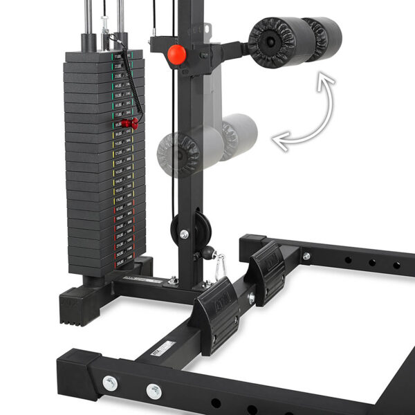 The ATX® HRX-620 Half Rack System Pin Loaded 115 kg features a stack of weights labeled from 10 to 150 lbs, adjustable rollers indicated by an arrow on the metal frame, and foot pedals.