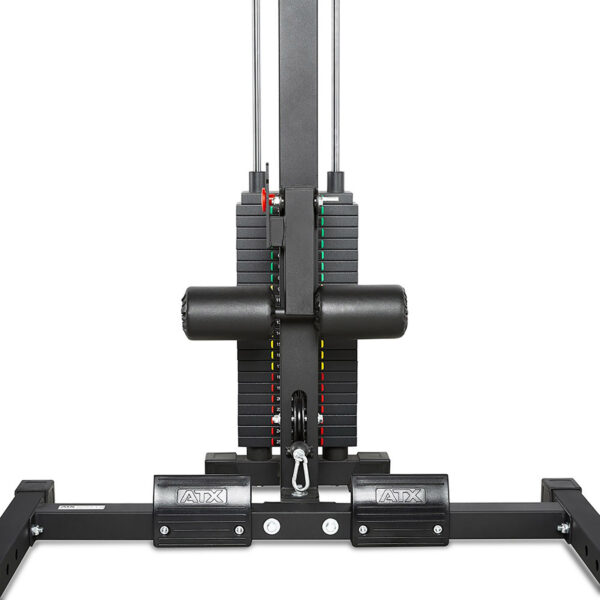 A close-up view of an ATX® HRX-620 Half Rack System Pin Loaded 115 kg shows a weight stack machine with colorful indicators on the plates and a cable attachment. The ATX logo is visible on the metal footrests at the bottom.