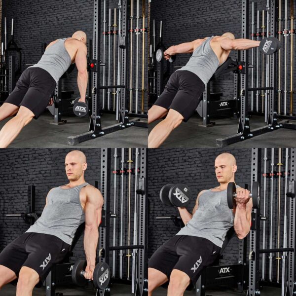 In a dark gym, a man showcasing strength uses dumbbells and a cable machine. He wears a gray tank top and black shorts, making use of the ATX® The Bridge Supporting Pad among visible equipment and weights while performing various exercises.