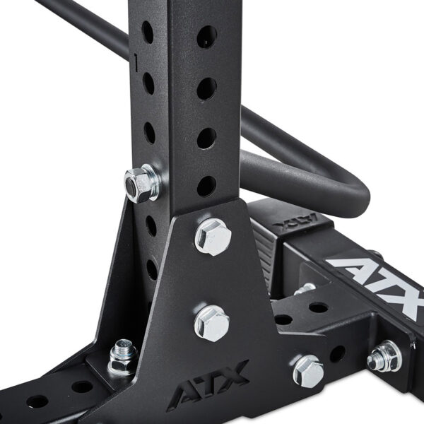 A close-up shows the ATX® Squat Stands Braces heavy-duty black metal frame, featuring bolts and holes, with the ATX brand logo visible.