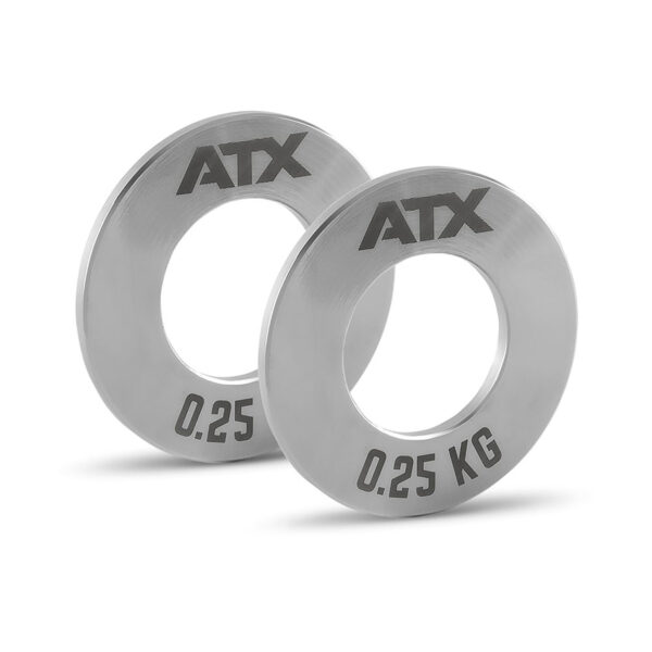 Two ATX® Olympic Fractional Plate Pairs with ATX logo and 0.25 KG engraved, each featuring a central hole for barbell mounting, set against a plain white background.