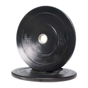 Two Black Olympic Bumper Weight Plates, each marked with 5 KG, are pictured; one leans against the other, which is lying flat.
