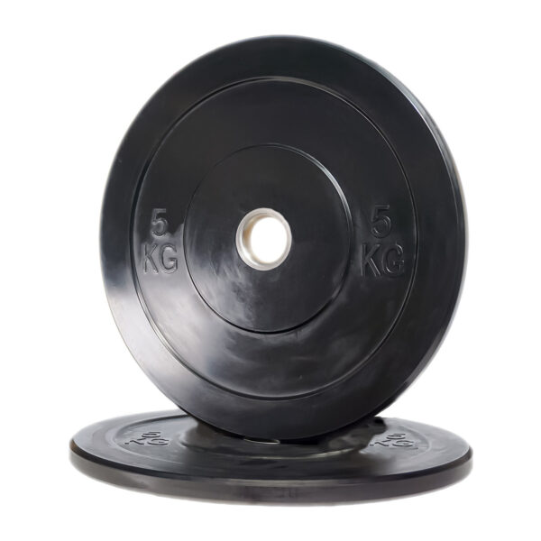 Two Black Olympic Bumper Weight Plates, each marked with 5 KG, are pictured; one leans against the other, which is lying flat.