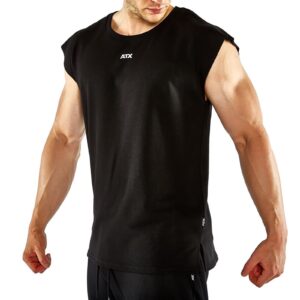 A person wearing an ATX® Muscle Shirt, a sleeveless black workout top featuring ATX on the front, displays muscular arms. The photo highlights the upper body and shirt design.