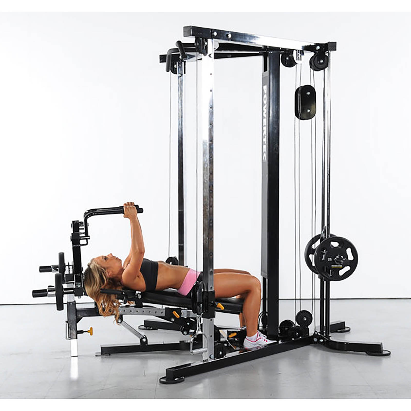 Woman doing leverage pec flys