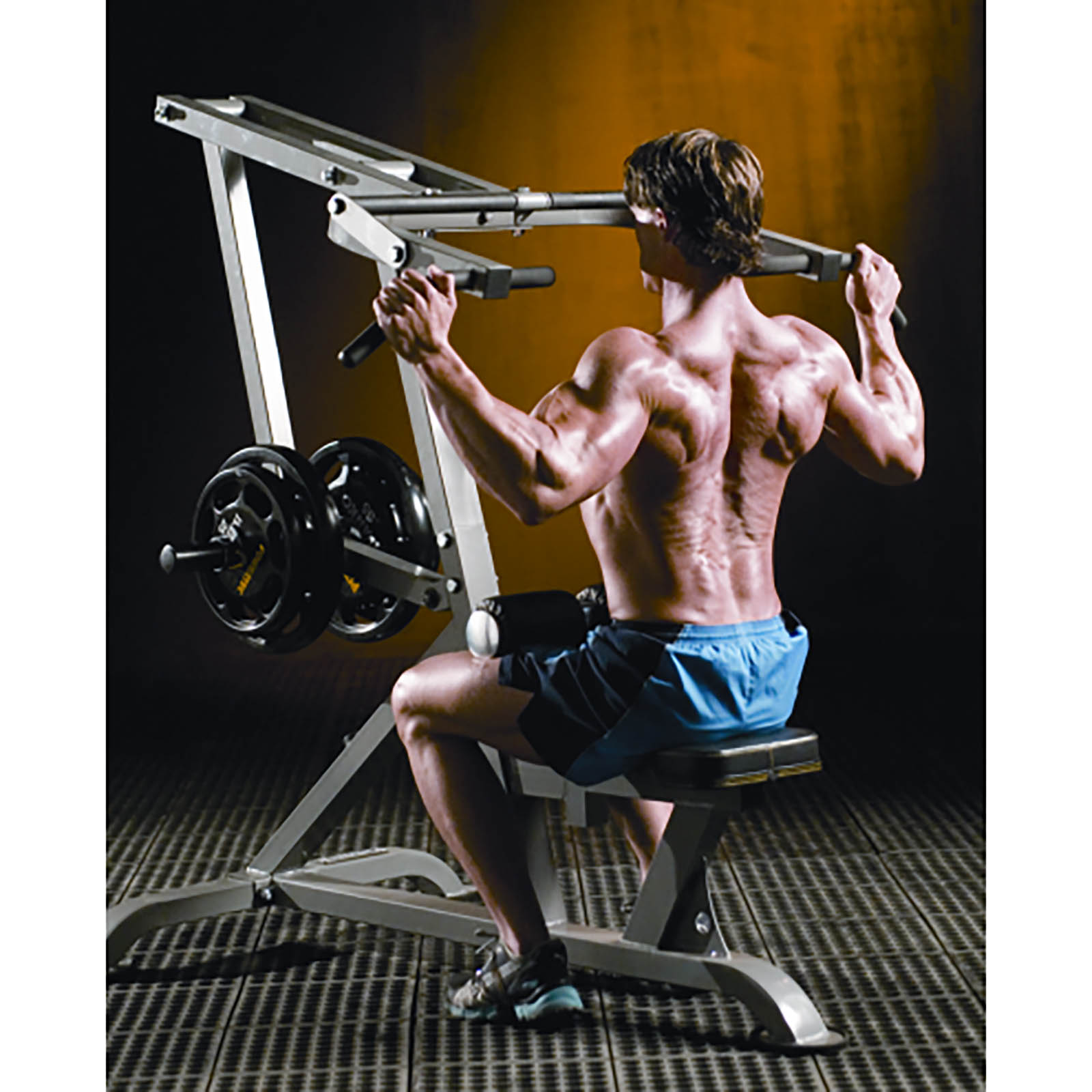 A man doing leverage lat pulldowns on a Powertec machine