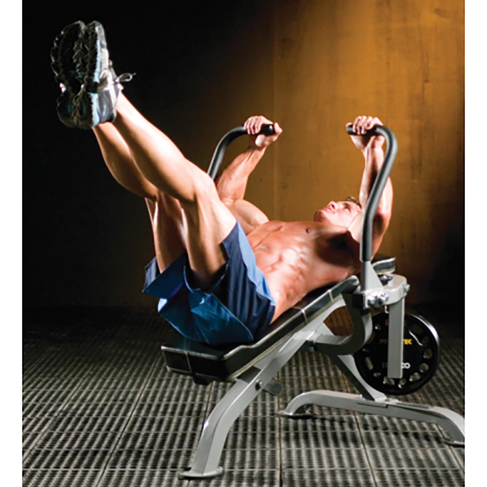 Man doing leg raises on the Powertec Leverage Maxi Crunch