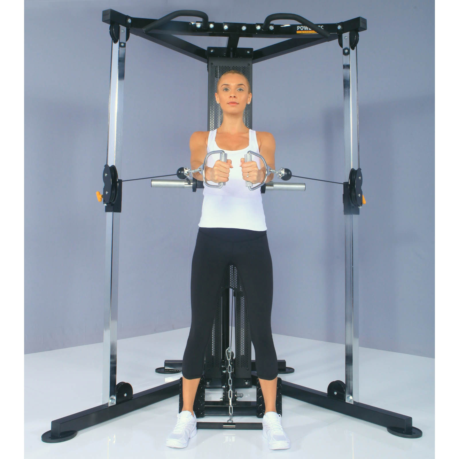Woman doing flys on a Functional Trainer