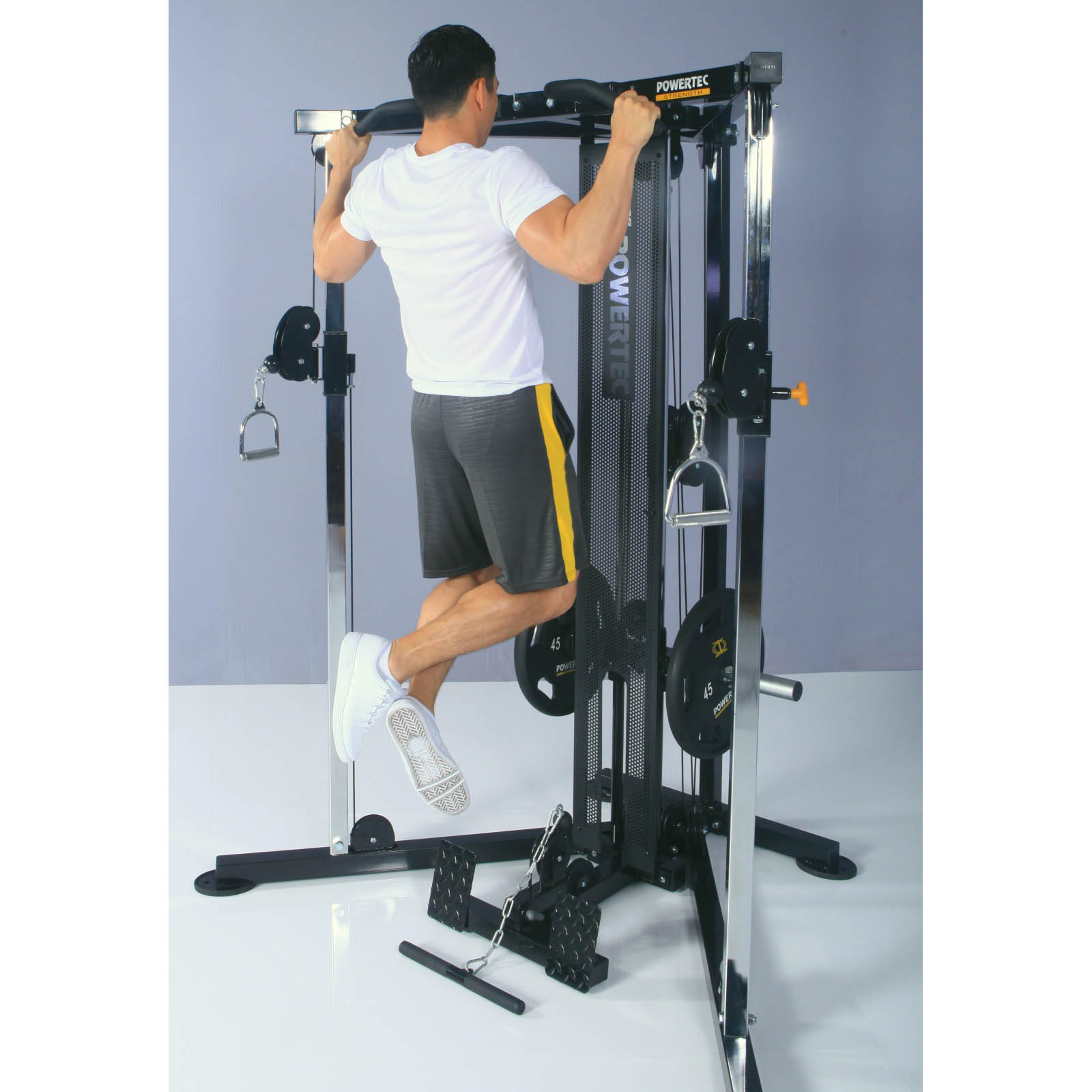 A man doing a chin up on a functional trainer