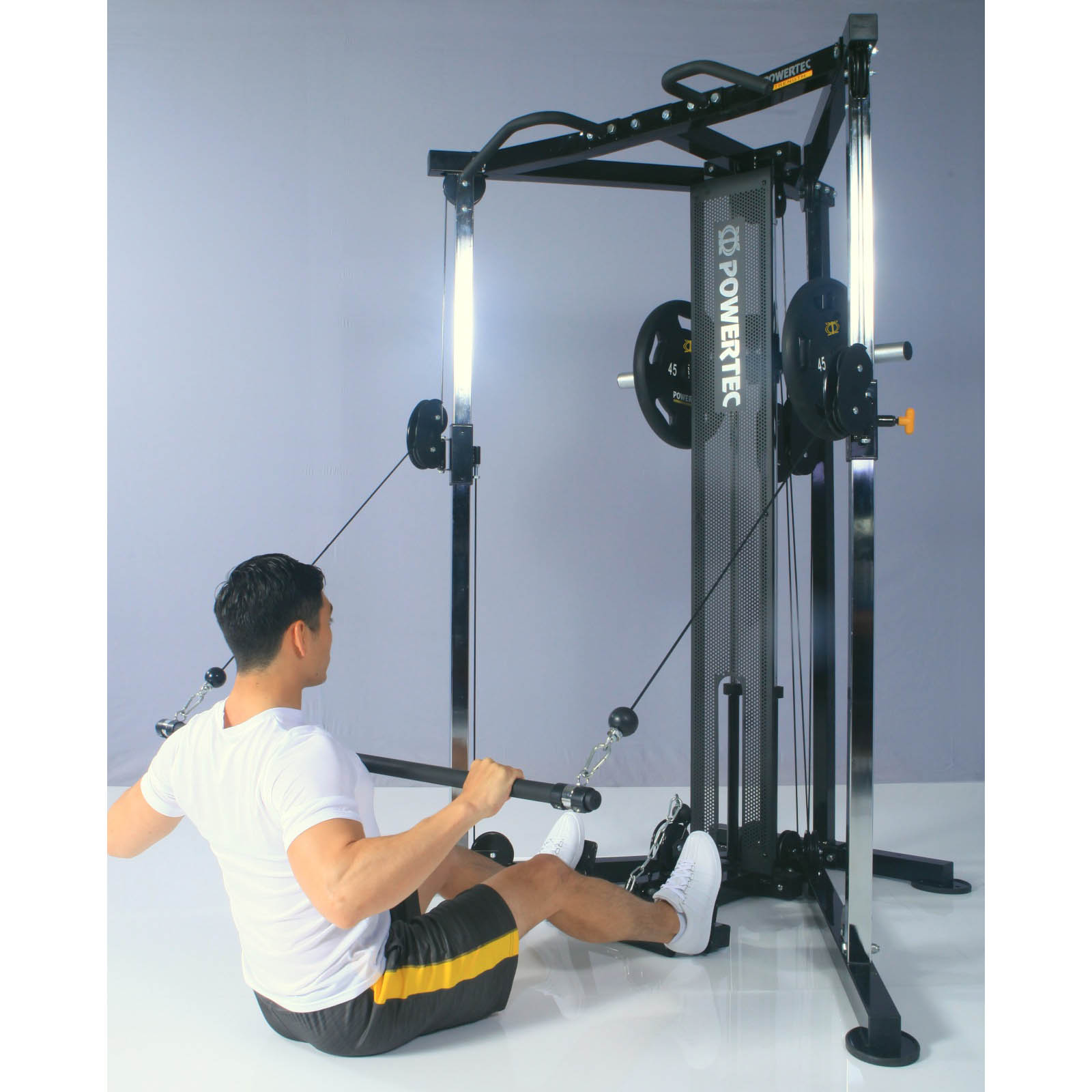 A man doing a seated lat pulldown on a cable crossover