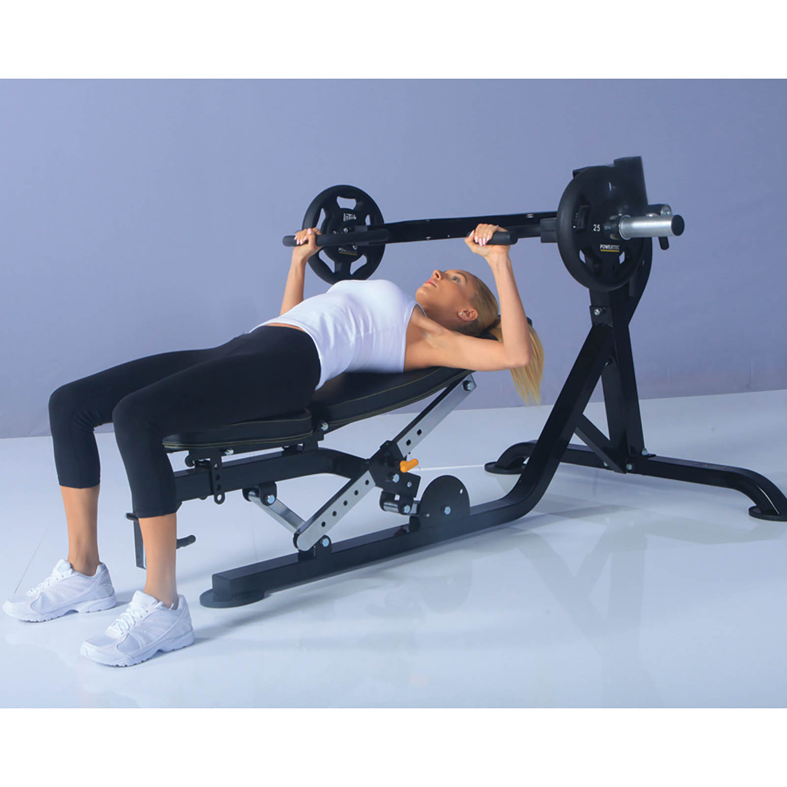 Woman doing a leverage bench press