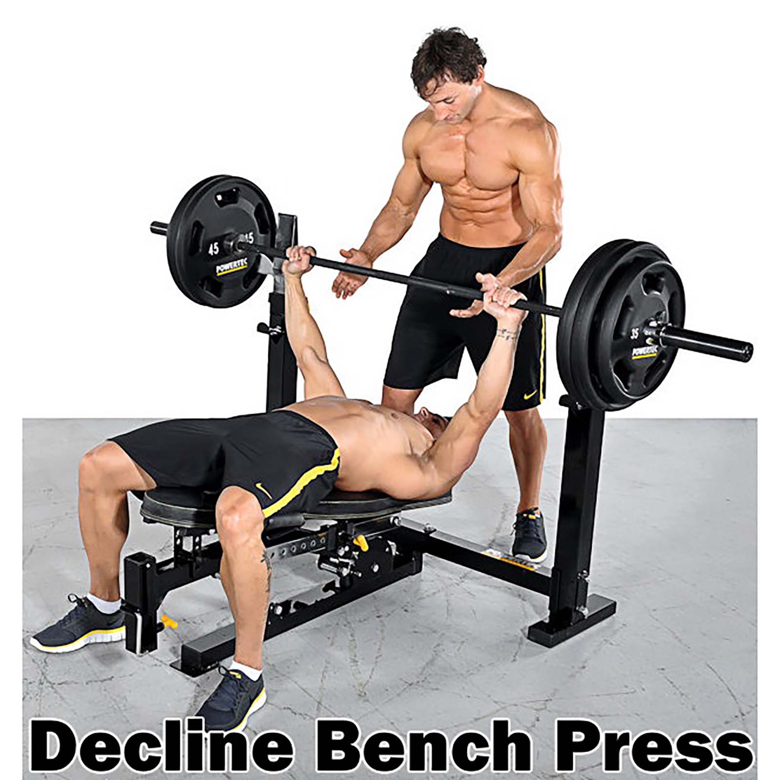Man spotting another man doing decline bench press