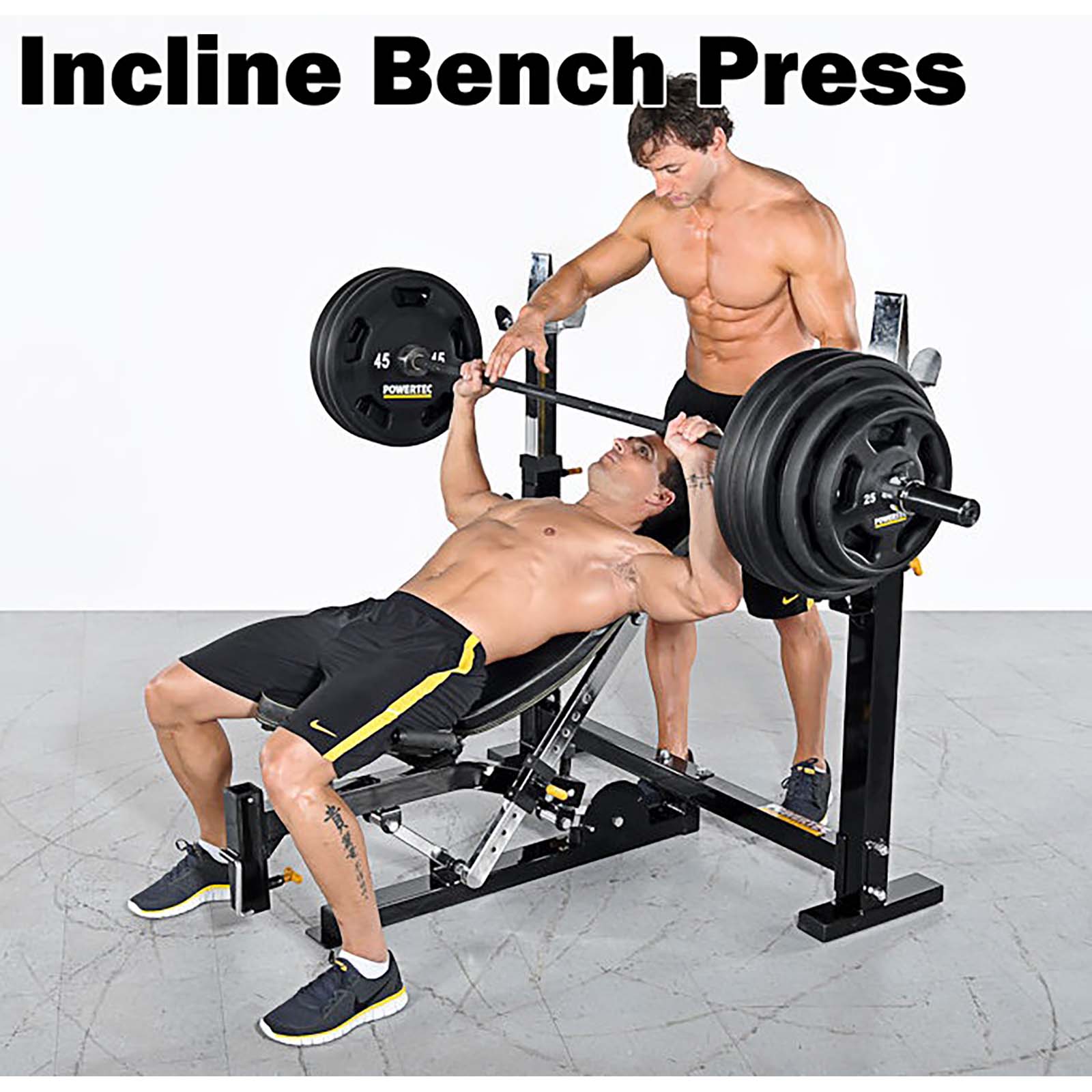 Man spotting another man on incline bench press