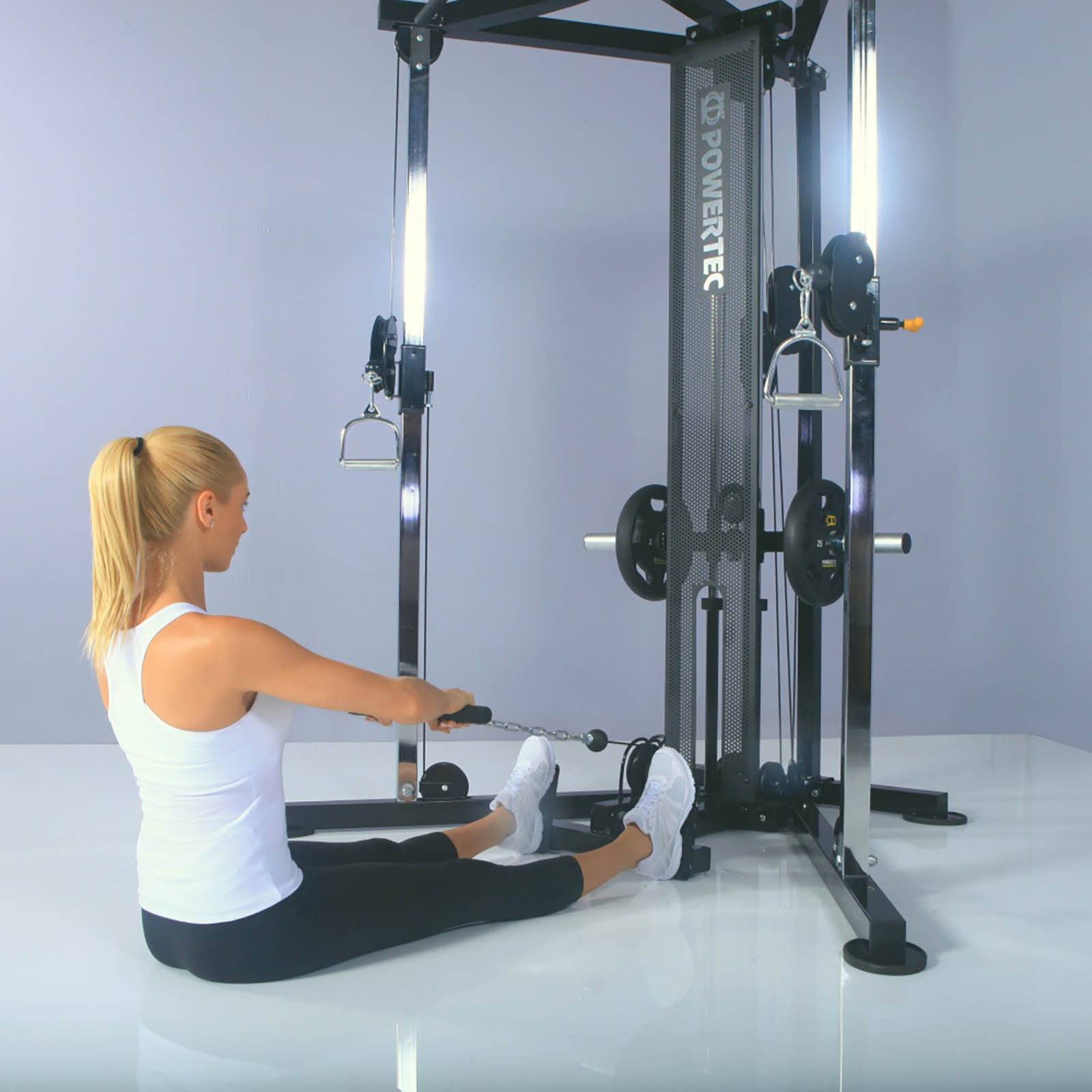Woman doing seated rows on functional trainer