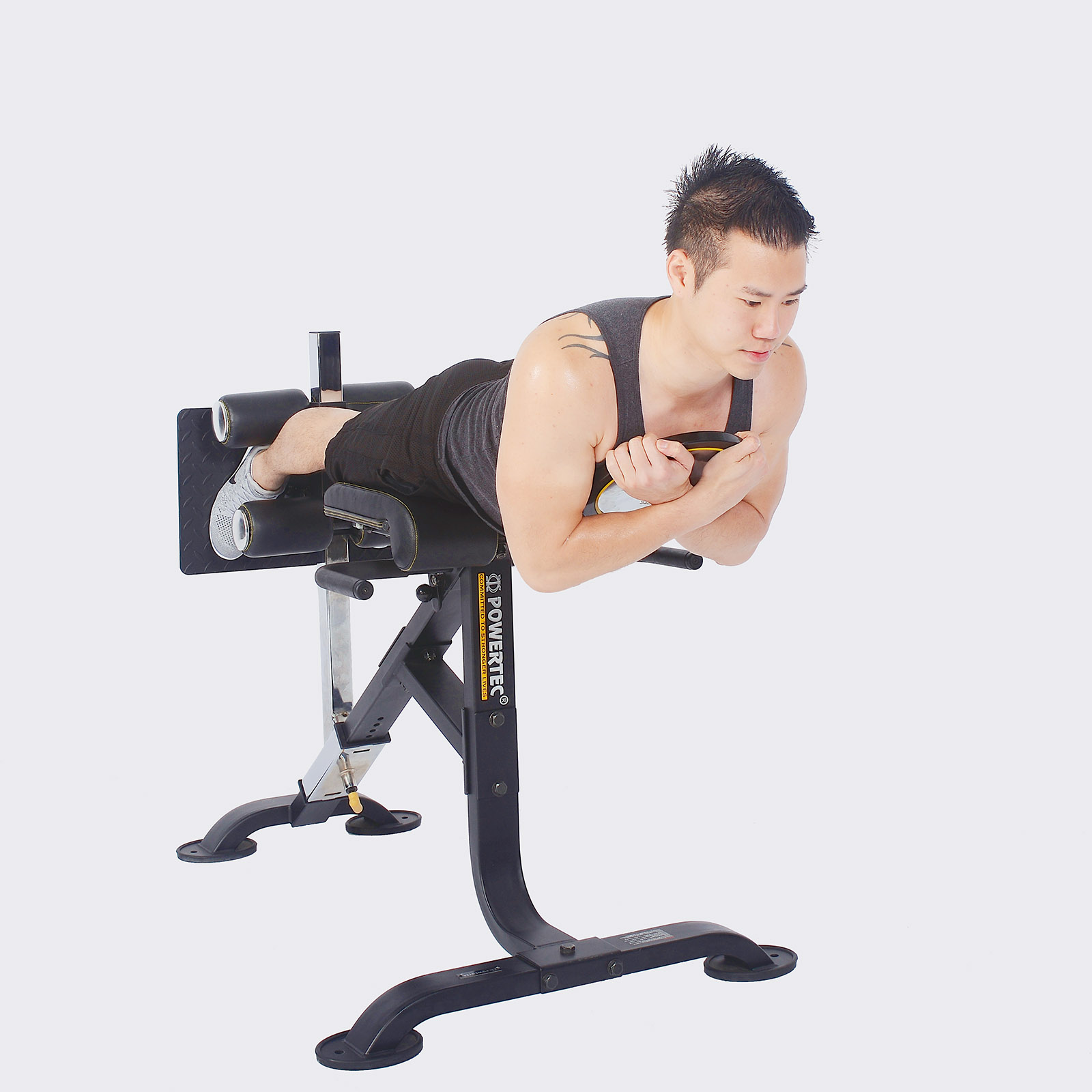 Man doing hyperextensions