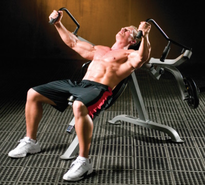 Man doing leverage pec flys on Powertec machine