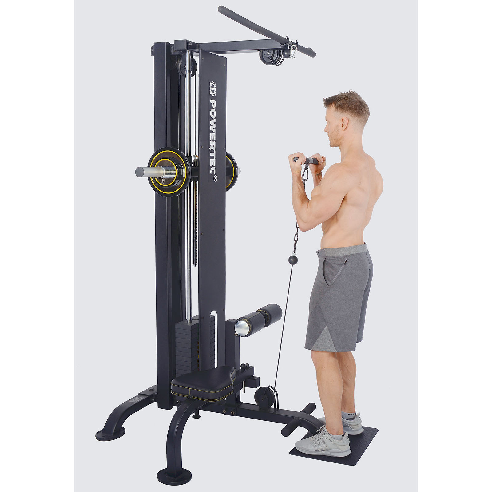 Standing bicep curls performed on a lateral machine