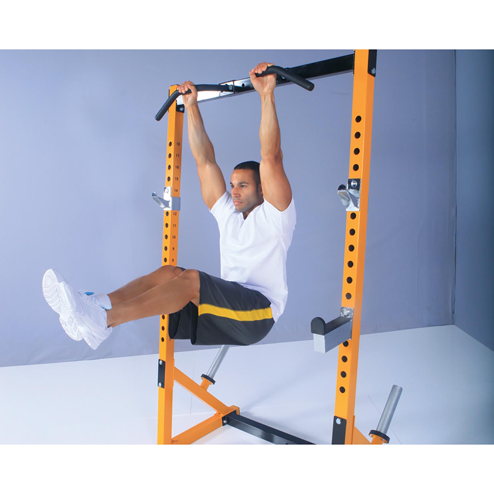 Man doing hanging leg raises