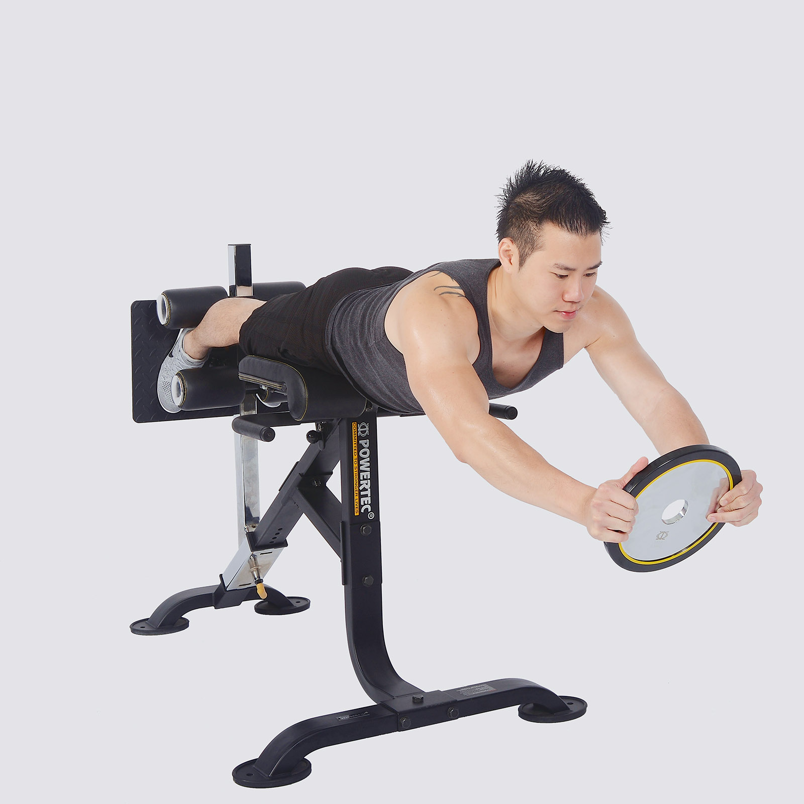 Man doing hyperextension with