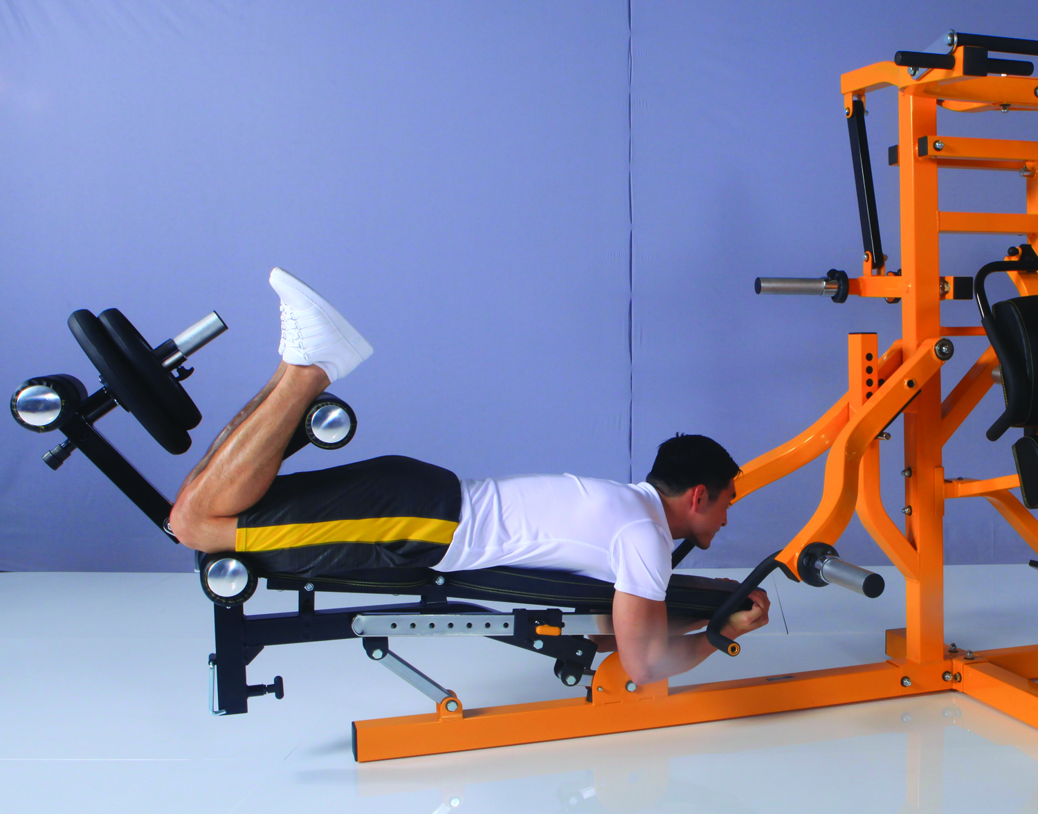 Many doing lying hamstring curl