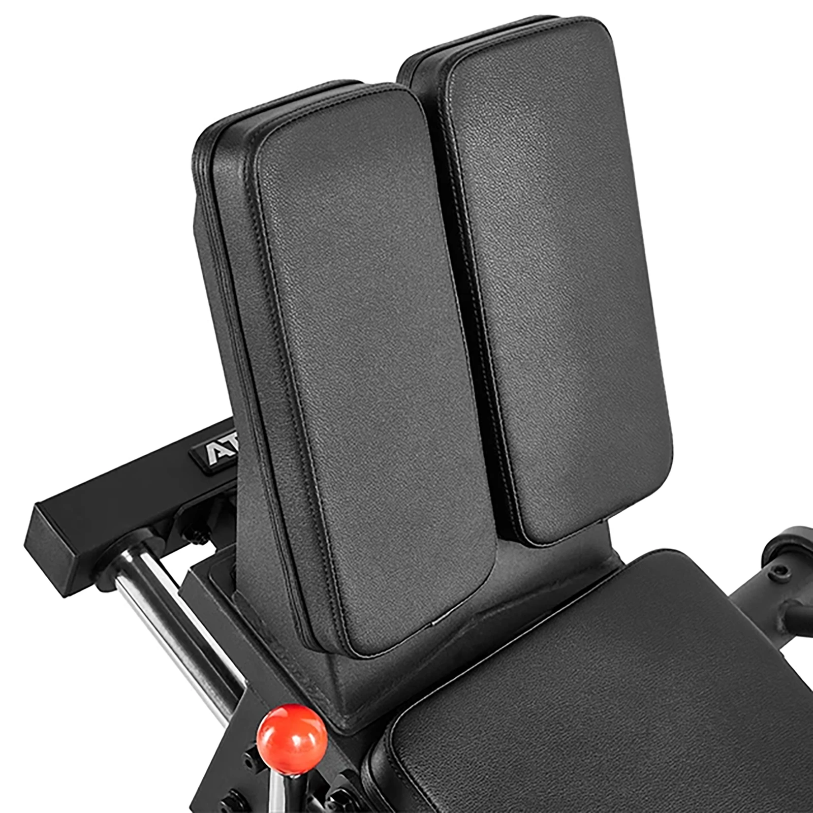 Close-up of a gym machine seat, showcasing black leather padded backrests. This sleek ATX Compact Leg Press includes durable metal parts and a red adjustment knob, perfect for enhancing your workout. Set against a plain white background, it epitomizes modern fitness design.