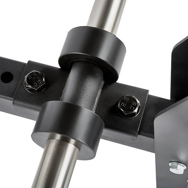 Close-up of the ATX® Belt Squat Options metal structure, featuring a horizontal bar connecting with a vertical bar, secured by round black brackets and two bolts. The materials are sturdy and exhibit a sleek metallic finish.