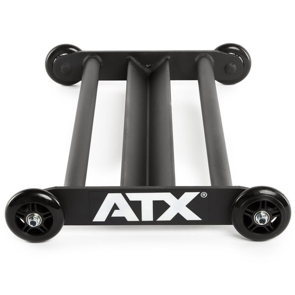 The ATX® Glute Ham Roller, a black device with a rectangular frame and four wheels, is designed to support and transport skateboards. Additionally, it serves as a versatile core hamstring roller for fitness enthusiasts looking to enhance their workout routines.