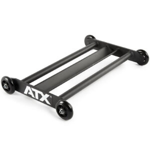 The ATX® Glute Ham Roller is a black roller dolly designed with two parallel bars and four wheels, making it perfect for effortlessly moving heavy gym equipment. Ideal for positioning machines like a GHR machine or core hamstring roller, the ATX logo is prominently displayed on the side.