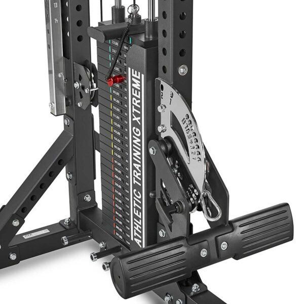 Close-up of the ATX® Trinity Tower 135 kg machines weight stack showcasing its adjustable plates and numbered resistance guide, complete with a visible metal frame and pulley system.